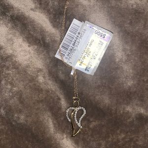 Angel diamond pendant. Gold. New with tags. Real diamond and real gold.